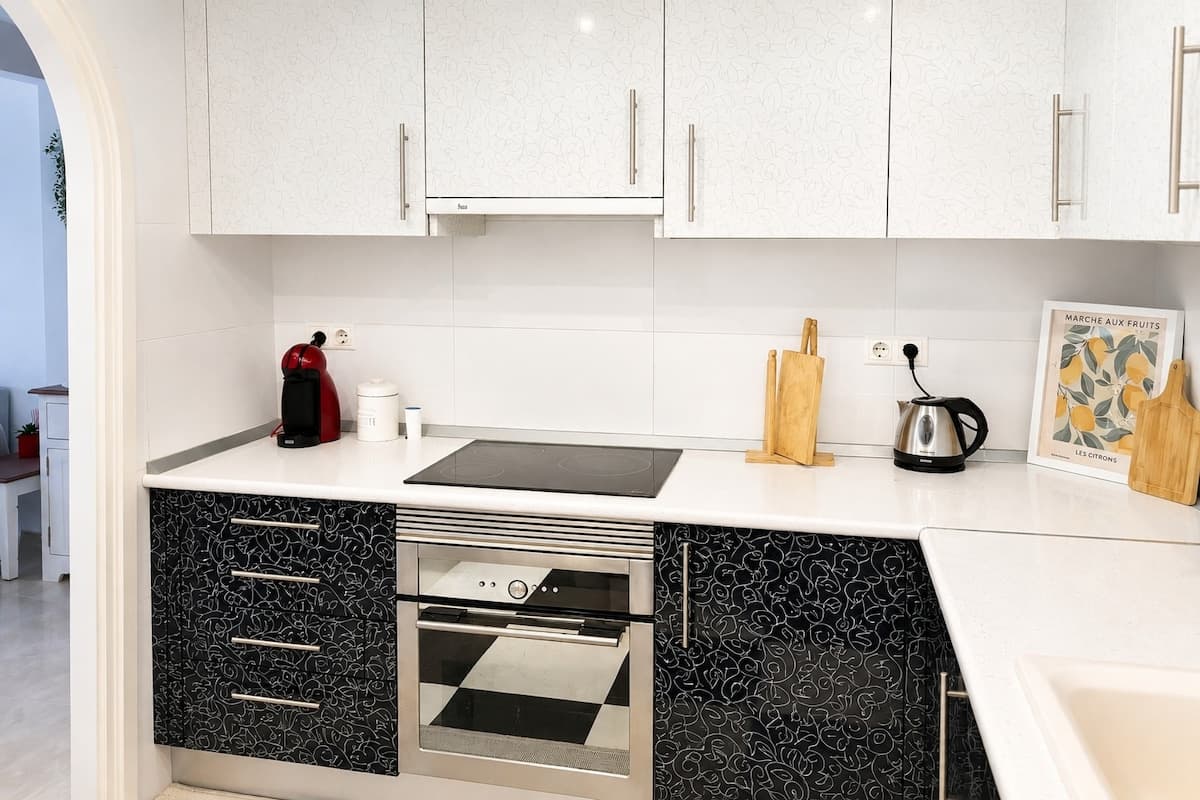Kitchen with induction hob and coffee