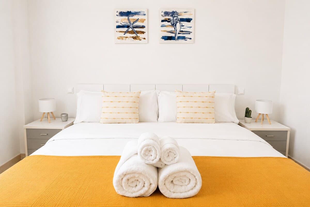Bedroom with fresh towels
